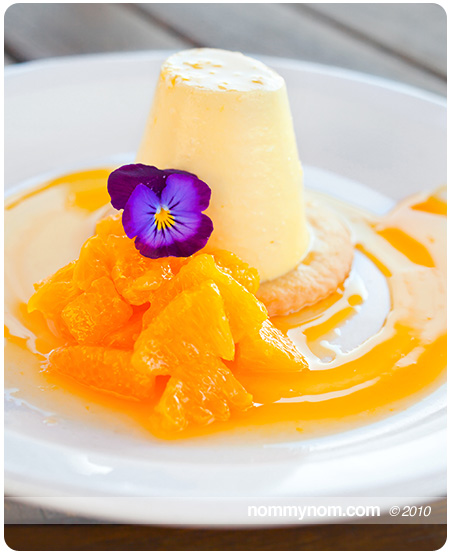 Allium Restaurant's Mango Cheesecake with Orange Lillkoi Sauce made by Anna Harlow